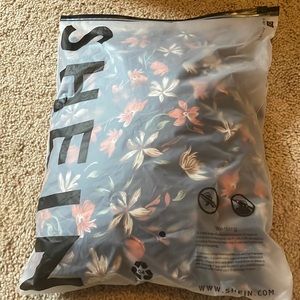 New, never worn. SHEIN plus size maxi dress. Accidentally bought two.